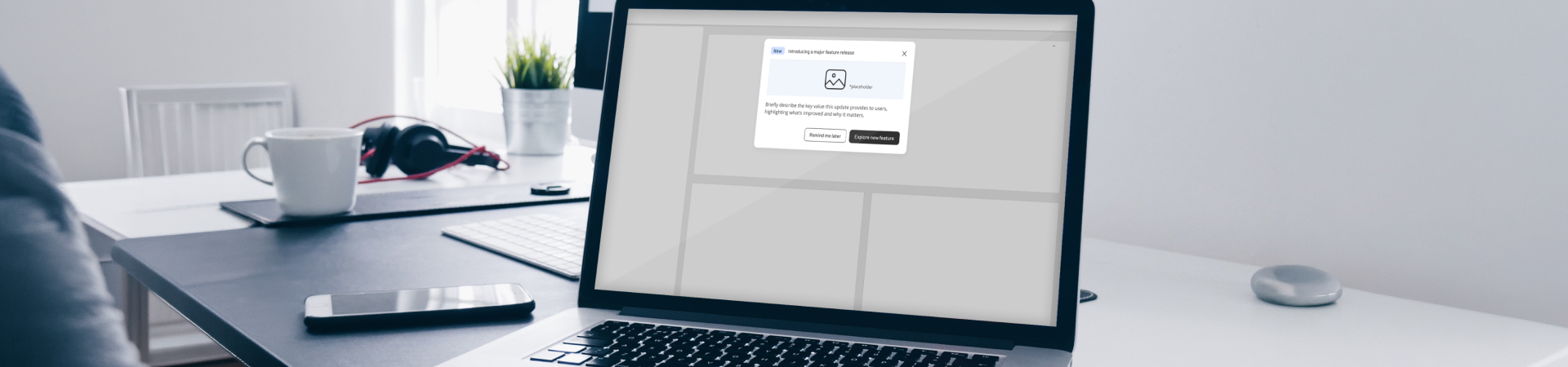 Laptop with feature release modal